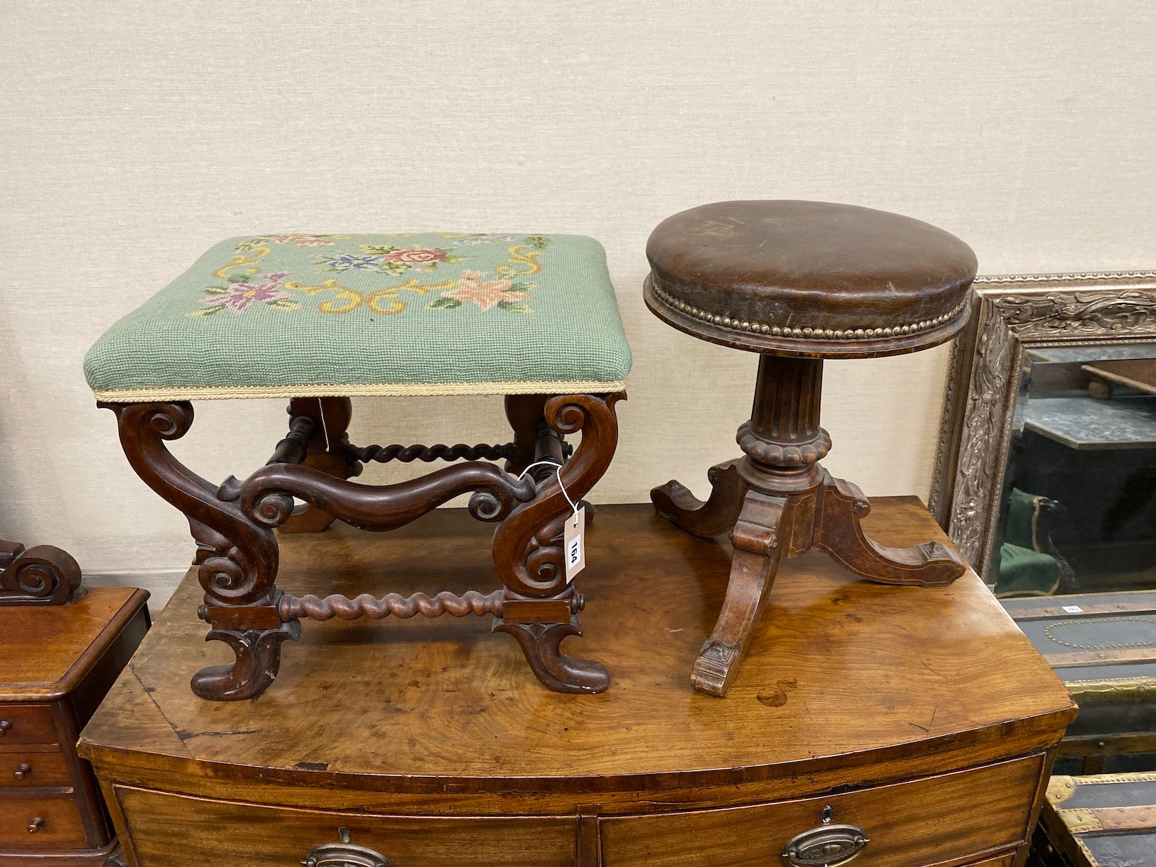 A Victorian rosewood dressing stool and a revolving adjustable piano stool